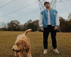 He has adopted a dog and enjoys taking a long walk with him.